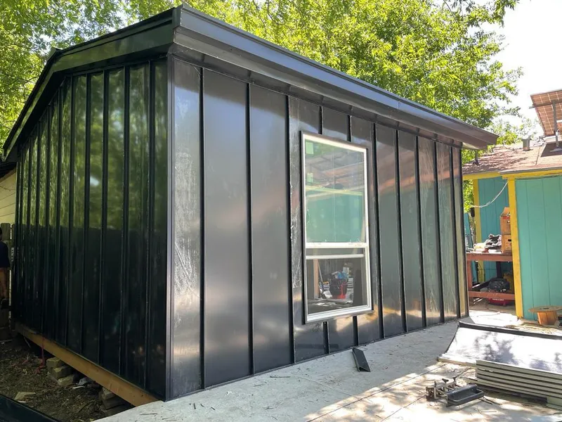 Black standing seam metal wall panels for Metal Roof Installation in Lakeville